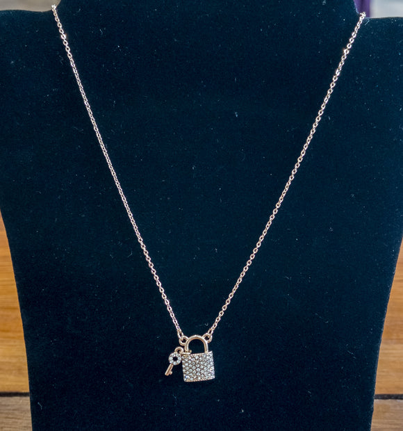 Jeweled lock pendant necklace